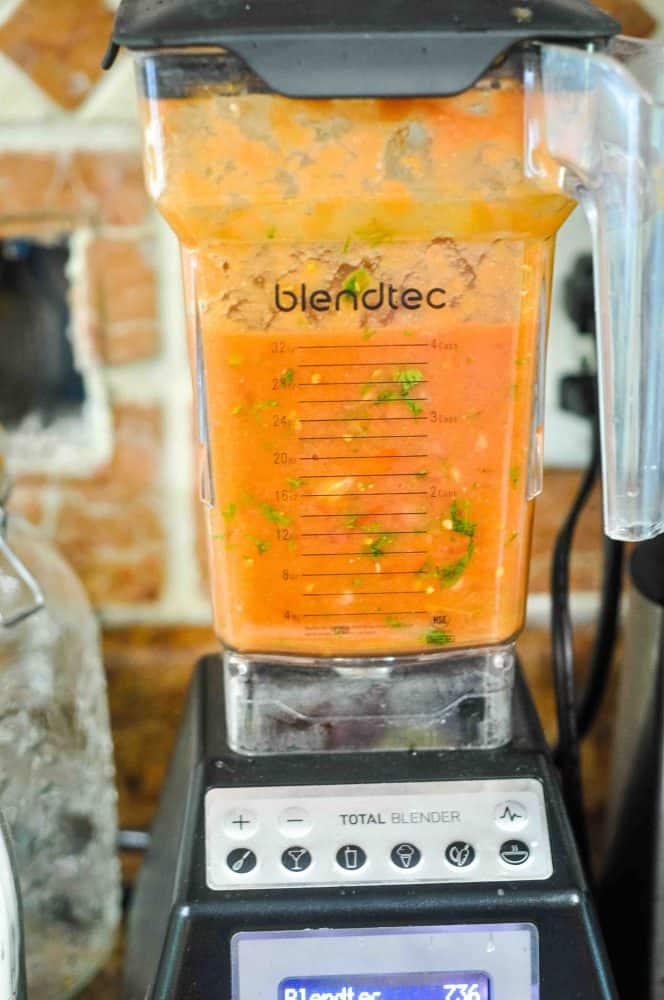 Garlic blender salsa being blended in the Blendtec blender.