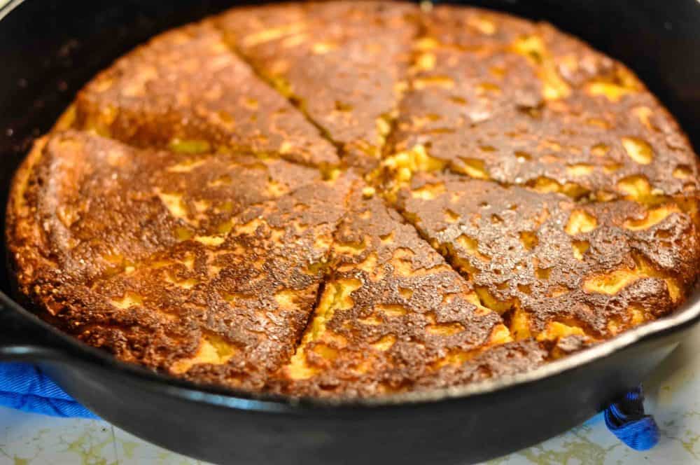 Southern cornbread in a cast iron skillet.