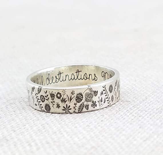 Silver ring with floral embellishment