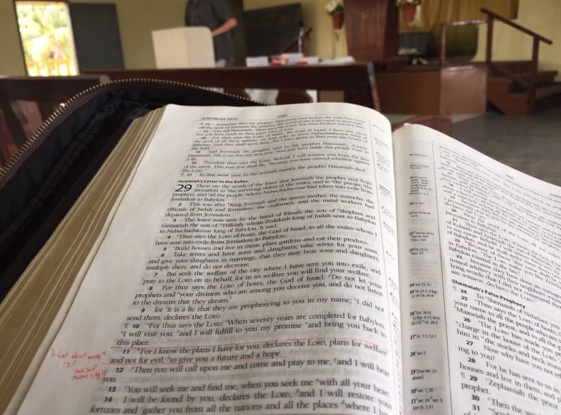 Close up of an open Bible in a bible study setting for Christian women