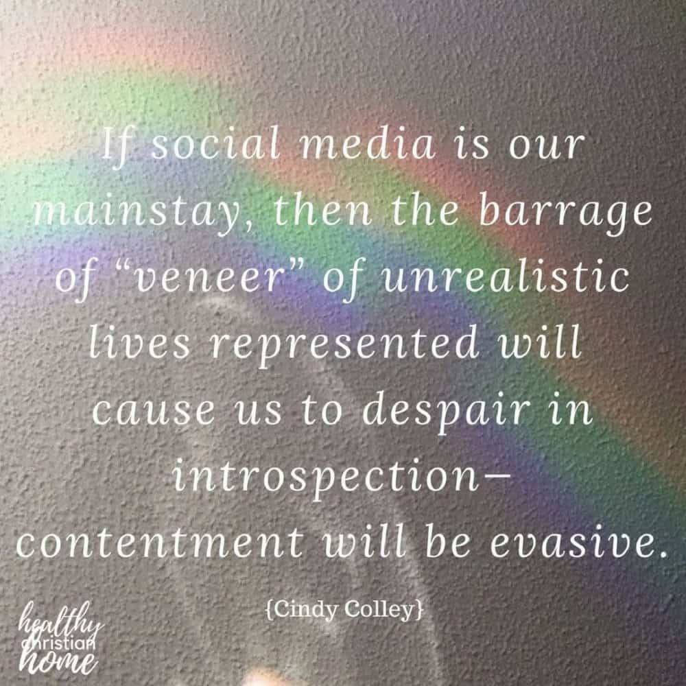 Quote about Christian contentment and social media on a background photograph of a rainbow.