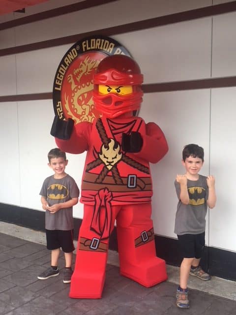 Two boys at Legoland with a Lego ninja