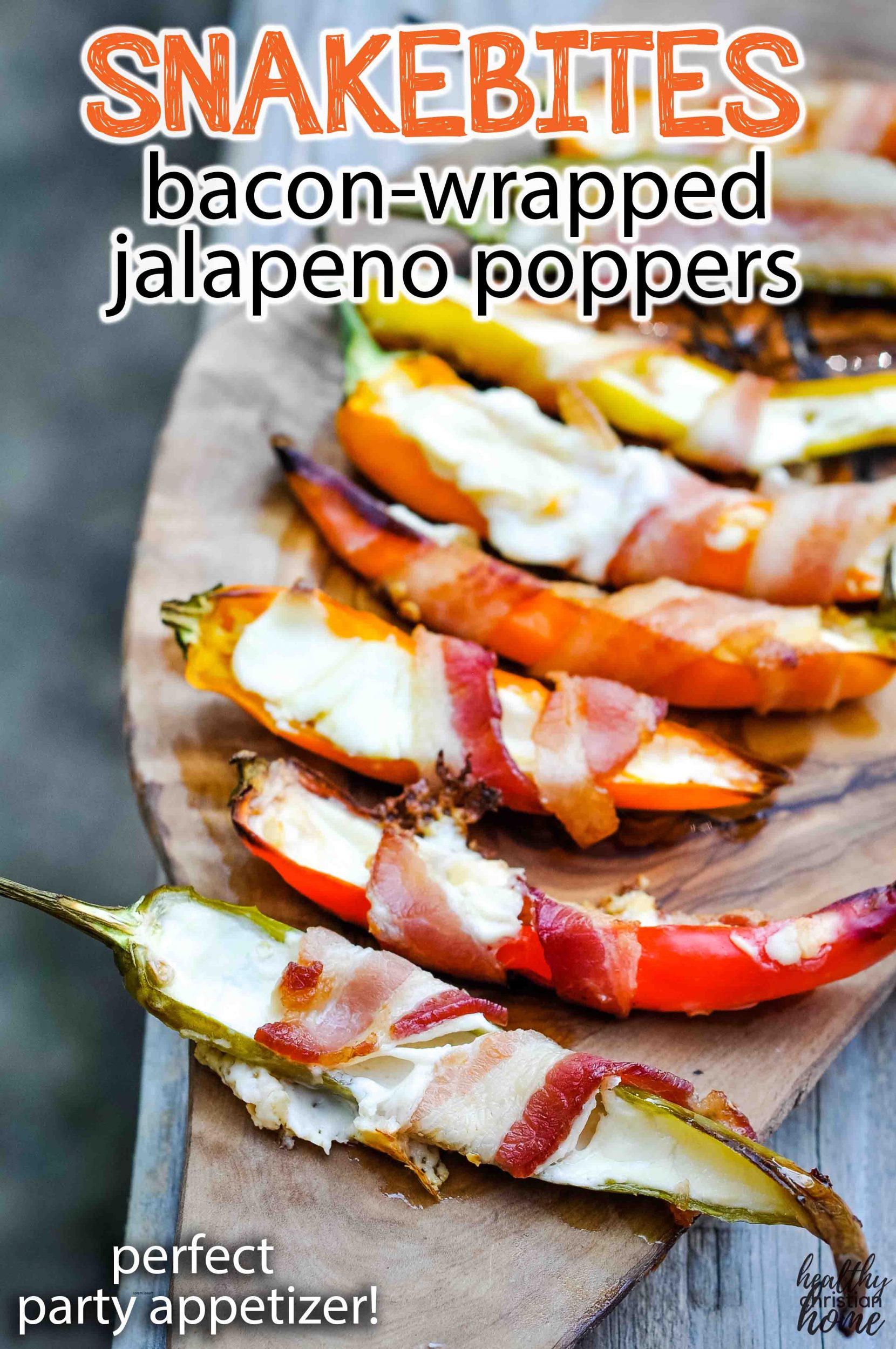 Bacon wrapped jalapeno poppers on a platter.