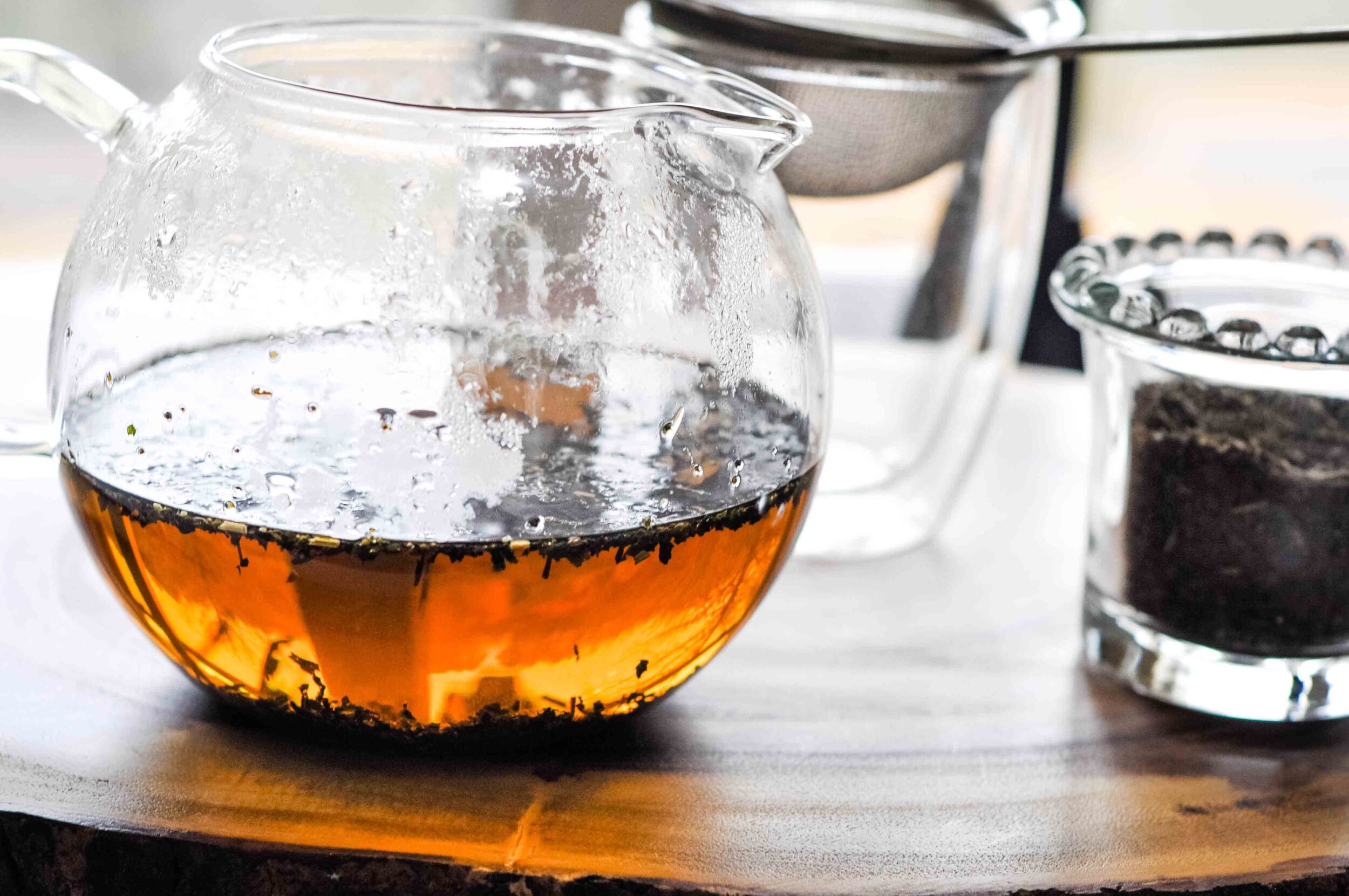 Nettle tea in a clear teapot.