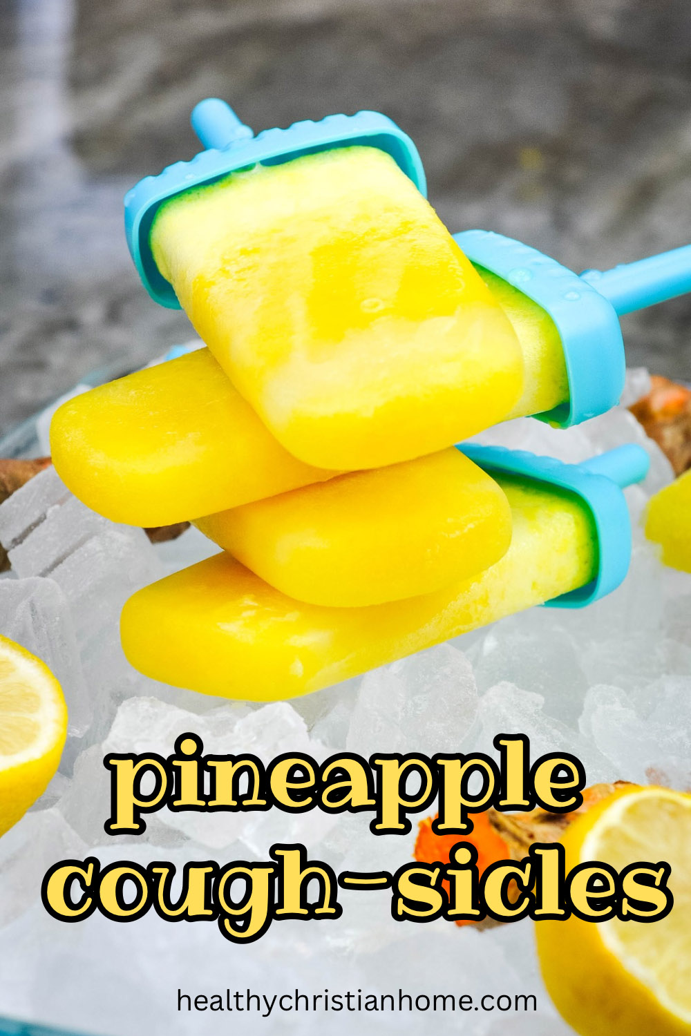Immune boosting pineapple popsicles stacked in a large dish of ice.