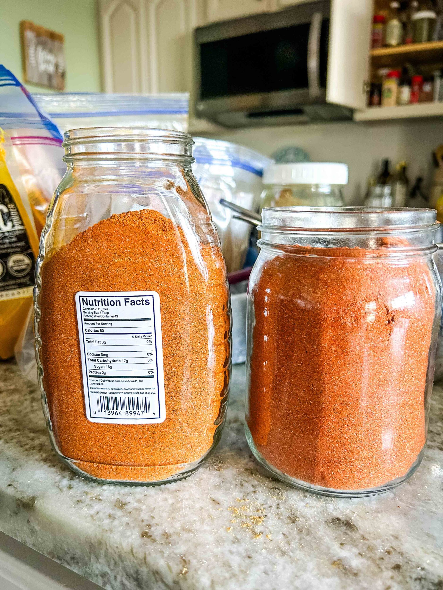 Butter chicken spice mixes in glass jars.