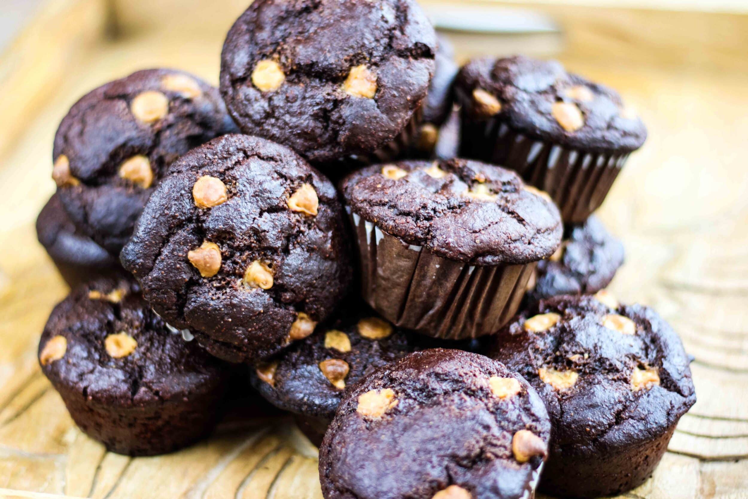 Millet oat chocolate muffins on a platter.