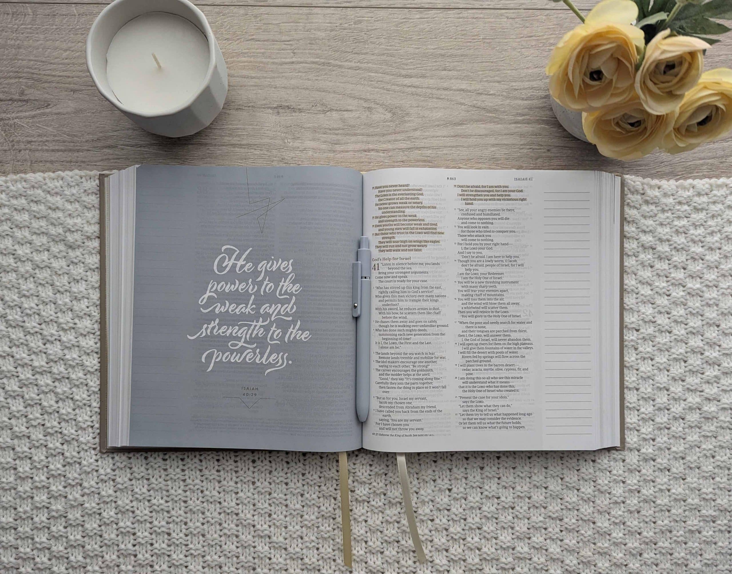 The new Every Woman's Bible by Tyndale opened on a table.